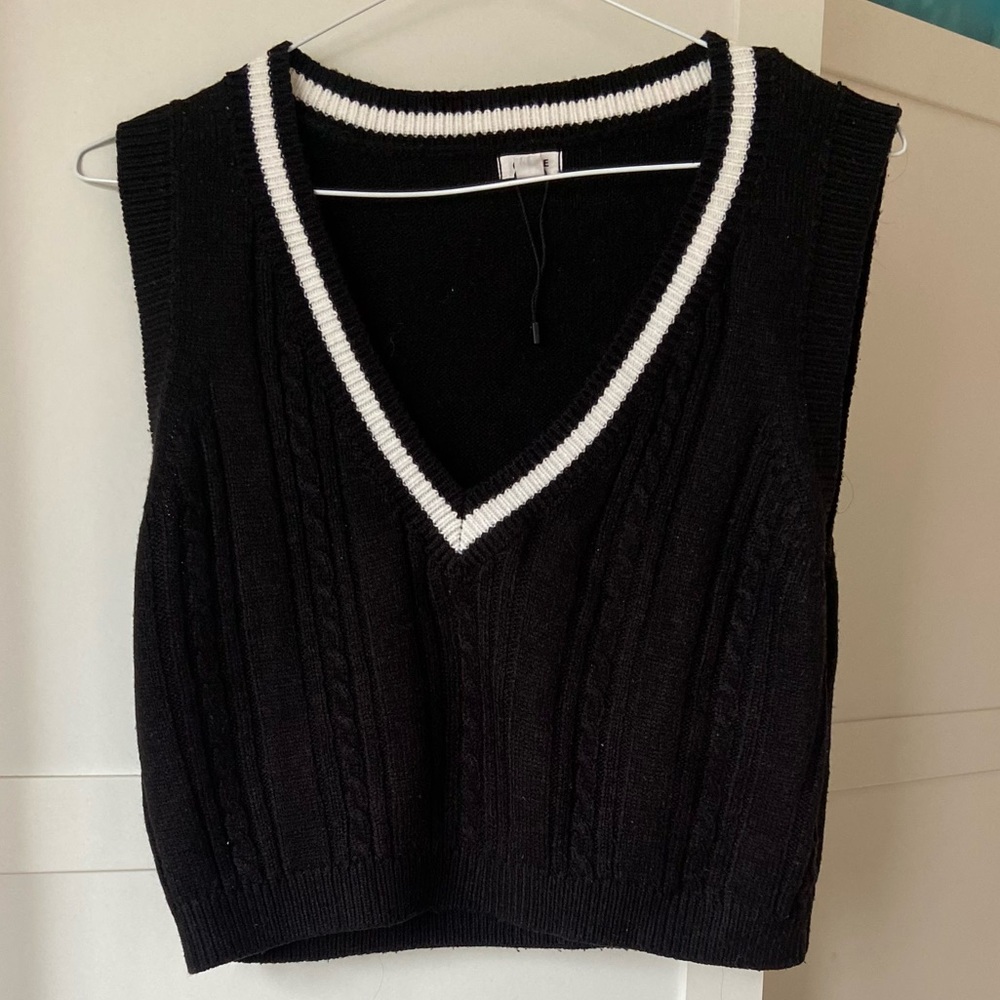 Cotton vest, black and white size small.